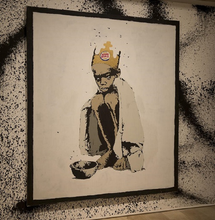 Banksy niño con hambre