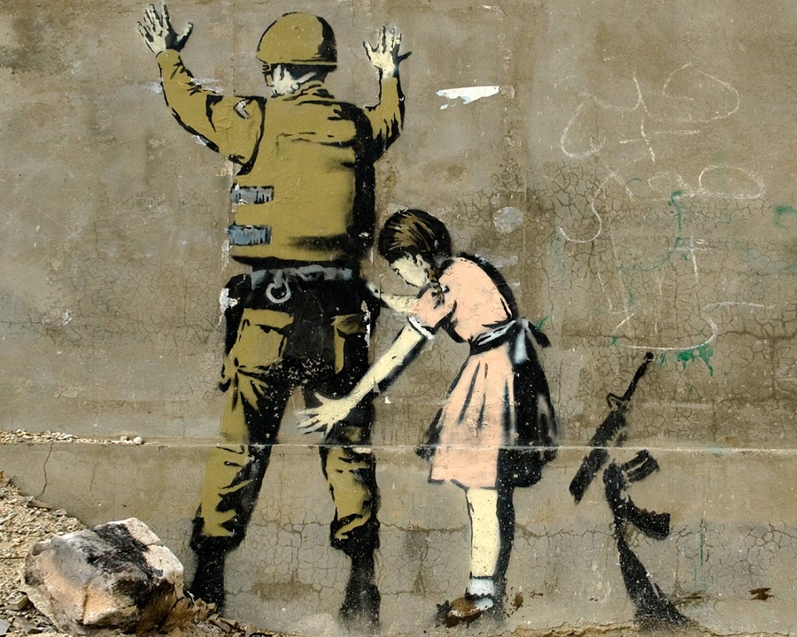 Soldier patdown by Banksy